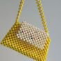 Beaded bags in yellow color