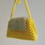 Beaded bags in yellow color