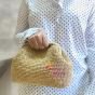Trendy raffia clutch 