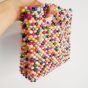 A bag of colored beads