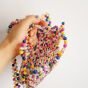 A bag of colored beads