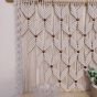 Macrame wall hanging with shelf 