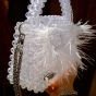 Crystal clear bag with feathers and fixed handle