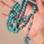 Rosary of 99 turquoise beads in hazel